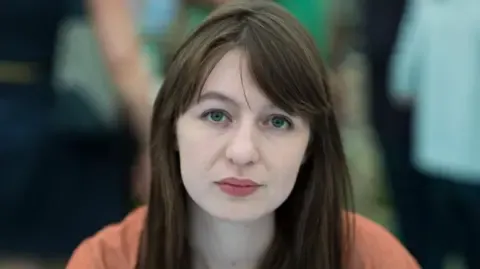 Irish author Sally Rooney claims she will not enter the UK because of potential arrest